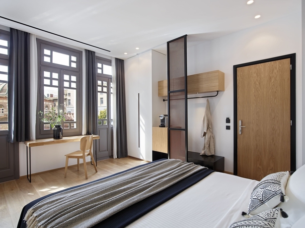 Imagen de la habitación del Hotel Innathens. Foto 10