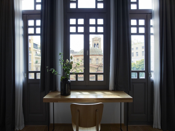 Imagen de la habitación del Hotel Innathens. Foto 11
