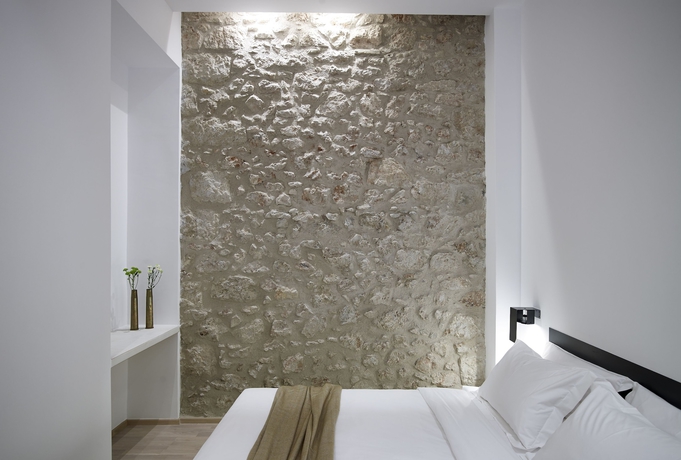 Imagen de la habitación del Hotel Innathens. Foto 13