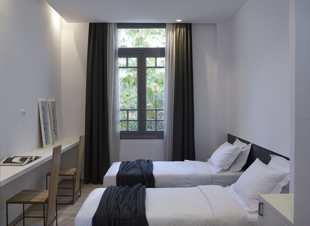 Imagen de la habitación del Hotel Innathens. Foto 16