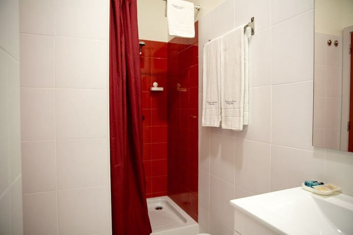 Imagen de la habitación del Hotel Inn-chiado Restauradores Prime Suites. Foto 9