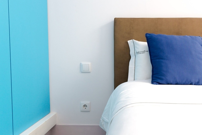 Imagen de la habitación del Hotel Inn-chiado Restauradores Prime Suites. Foto 13