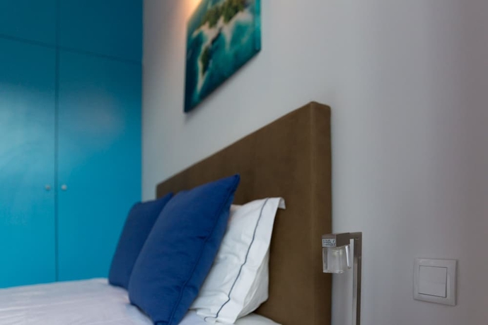 Imagen de la habitación del Hotel Inn-chiado Restauradores Prime Suites. Foto 14