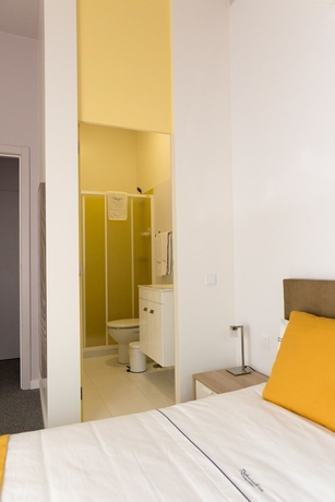 Imagen de la habitación del Hotel Inn-chiado Restauradores Prime Suites. Foto 18