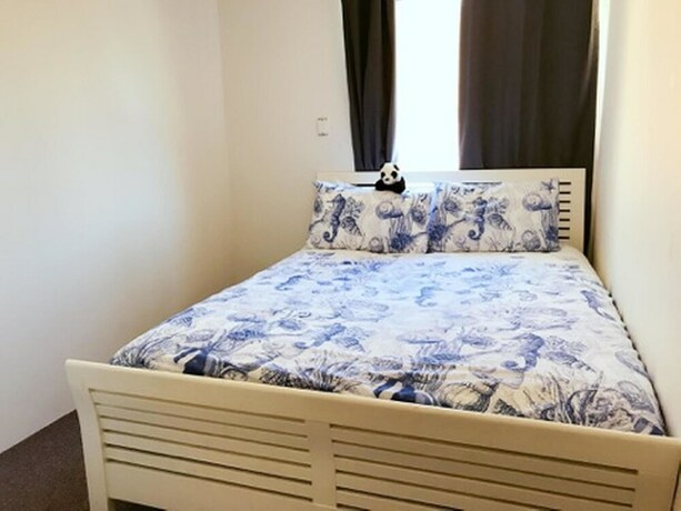 Imagen de la habitación del Hotel Inner City Apartments. Foto 9