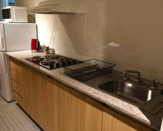 Imagen de la habitación del Hotel Inner City Apartments. Foto 18