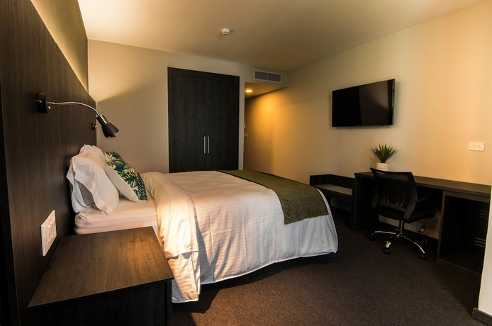 Imagen de la habitación del Hotel Innfiniti and Suites. Foto 5