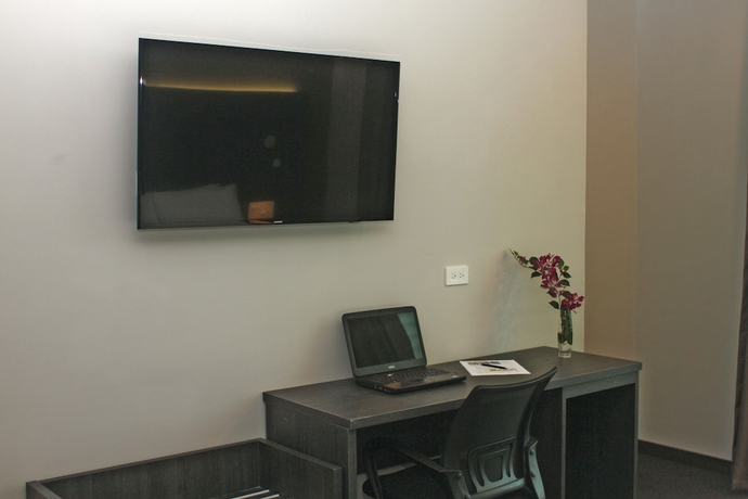 Imagen de la habitación del Hotel Innfiniti and Suites. Foto 9