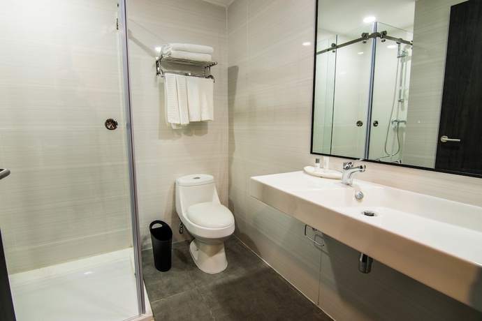 Imagen de la habitación del Hotel Innfiniti and Suites. Foto 10