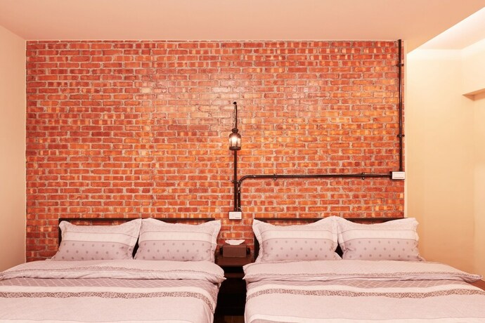 Imagen de la habitación del Hotel Inn-itiate Tainan. Foto 19