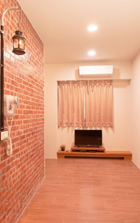 Imagen de la habitación del Hotel Inn-itiate Tainan. Foto 25