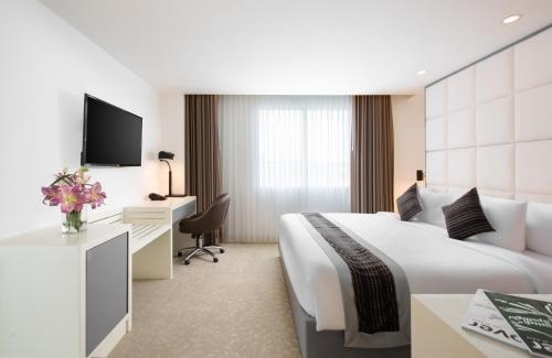 Imagen de la habitación del Hotel Innside Yogyakarta. Foto 9