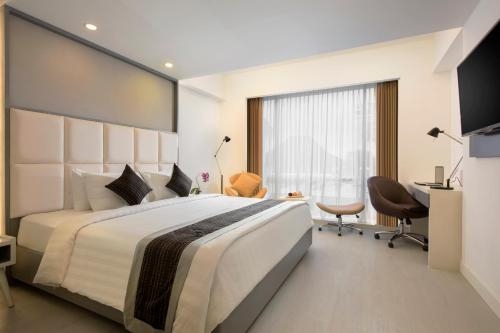 Imagen de la habitación del Hotel Innside Yogyakarta. Foto 10