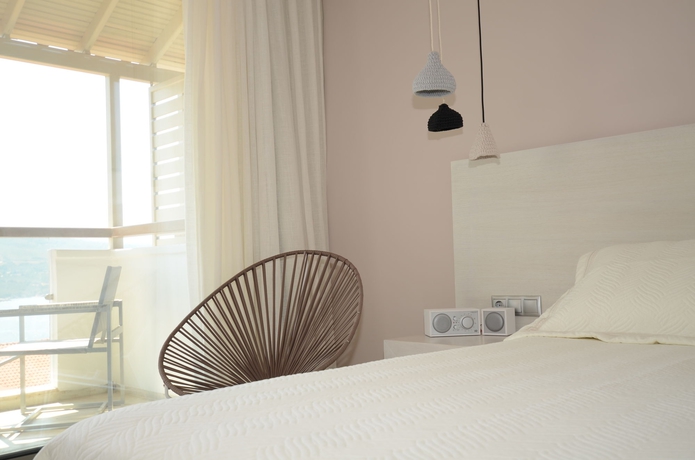 Imagen de la habitación del Hotel Ino Village. Foto 7