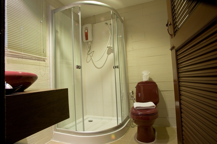 Imagen de la habitación del Hotel Inrawadee Resort. Foto 2