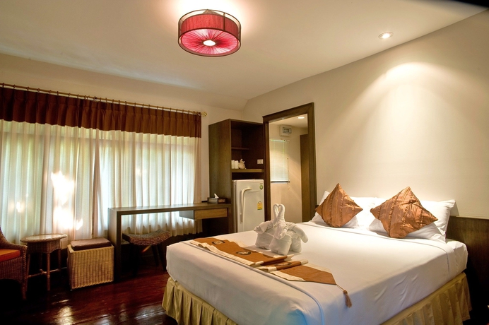 Imagen de la habitación del Hotel Inrawadee Resort. Foto 4
