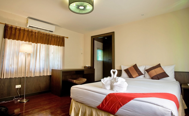 Imagen de la habitación del Hotel Inrawadee Resort. Foto 5