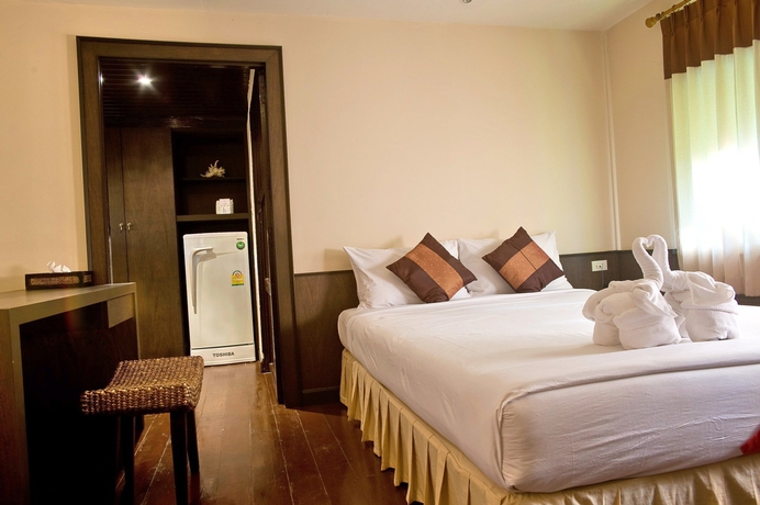 Imagen de la habitación del Hotel Inrawadee Resort. Foto 6