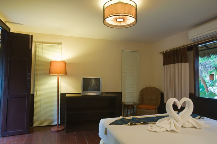 Imagen de la habitación del Hotel Inrawadee Resort. Foto 9
