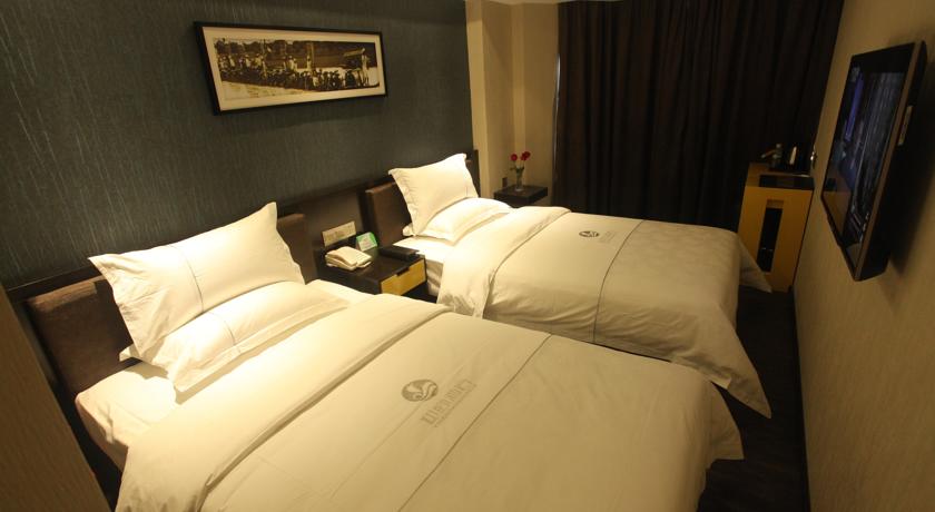 Imagen de la habitación del Hotel Insail Hotels Huanshi Road Taojin Metro Station Guangzhou. Foto 3