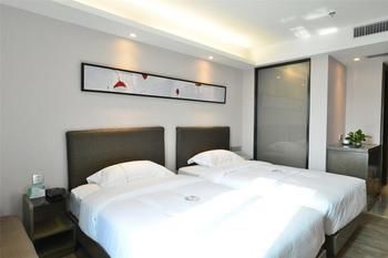 Imagen de la habitación del Hotel Insail Hotels (Pazhou Exhibition Center KeCun Metro Station Dunhe Road Branch Guangzhou). Foto 9