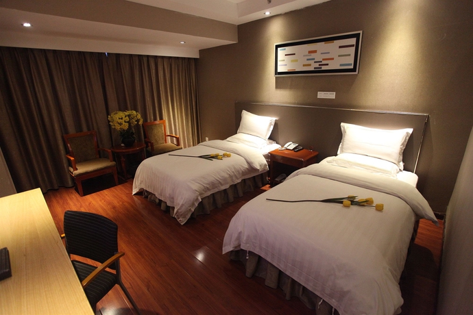 Imagen de la habitación del Hotel Insail Hotels - Railway Station Guangzhou. Foto 4