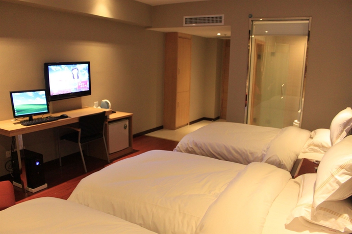 Imagen de la habitación del Hotel Insail Hotels - Railway Station Guangzhou. Foto 10