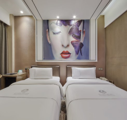 Imagen de la habitación del Hotel Insail Hotels (Zhongshanba Subway Station Guangzhou). Foto 3