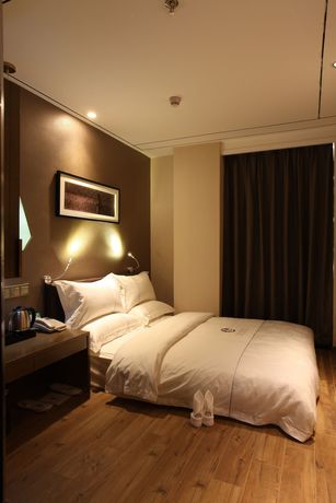 Imagen de la habitación del Hotel Insail Hotels (Zhongshanba Subway Station Guangzhou). Foto 7