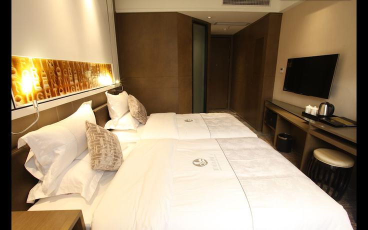 Imagen de la habitación del Hotel Insail Hotels (Zhongshanba Subway Station Guangzhou). Foto 8