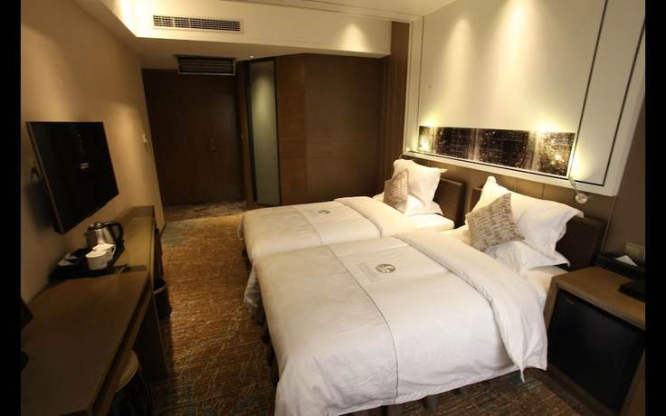 Imagen de la habitación del Hotel Insail Hotels (Zhongshanba Subway Station Guangzhou). Foto 9