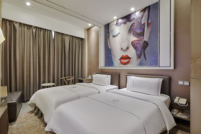 Imagen de la habitación del Hotel Insail Hotels (Zhongshanba Subway Station Guangzhou). Foto 11