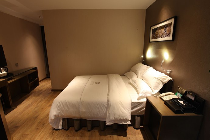 Imagen de la habitación del Hotel Insail Hotels (Zhongshanba Subway Station Guangzhou). Foto 14