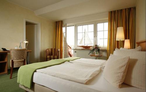 Imagen de la habitación del Hotel Insel B&uuml;sum. Foto 7