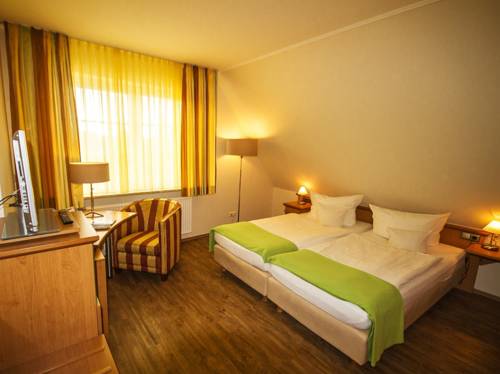 Imagen de la habitación del Hotel Insel B&uuml;sum. Foto 11