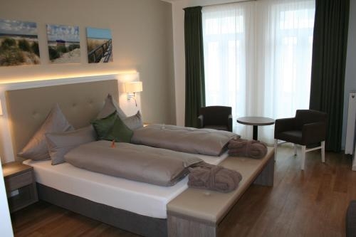 Imagen de la habitación del Hotel Inselhof Borkum. Foto 8
