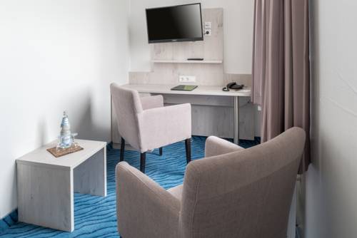 Imagen de la habitación del Hotel Inselhotel Rote Erde. Foto 4