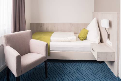 Imagen de la habitación del Hotel Inselhotel Rote Erde. Foto 11