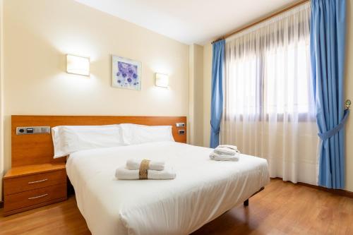 Imagen de la habitación del Hotel InsideHome Zaravencia Plaza Mayor. Foto 13