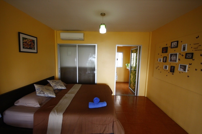Imagen de la habitación del Hotel Insook Ko Larn Guesthouse. Foto 9