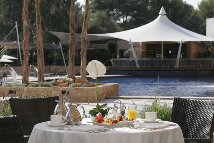 Imagen del bar/restaurante del Hotel Insotel Fenicia Prestige Suites and Spa. Foto 5