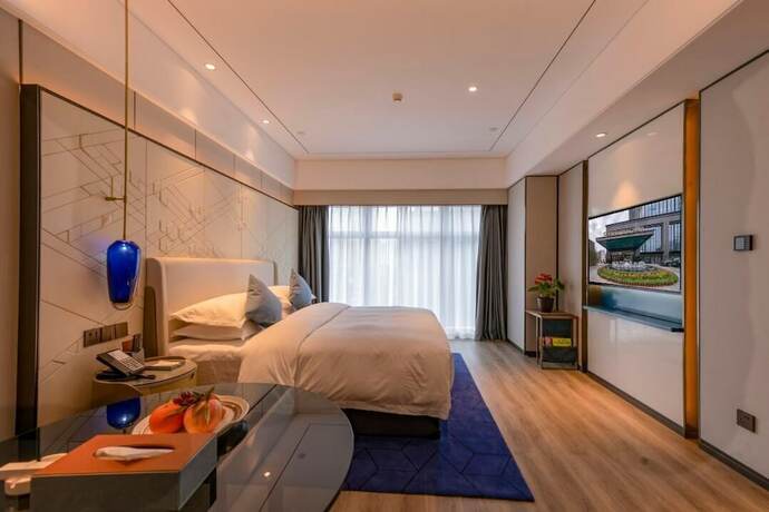 Imagen de la habitación del Hotel Int Landison Plaza Jinhua. Foto 8
