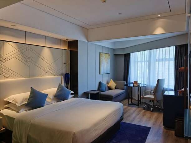 Imagen de la habitación del Hotel Int Landison Plaza Jinhua. Foto 14