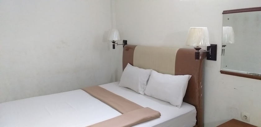 Imagen de la habitación del Hotel Intan Purwakarta. Foto 3