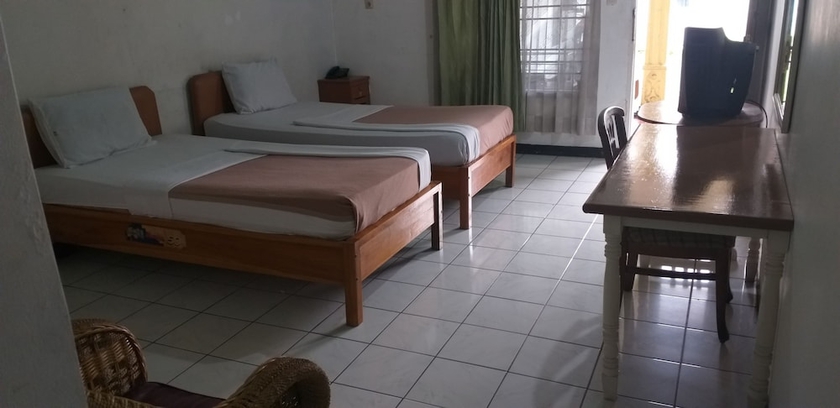 Imagen de la habitación del Hotel Intan Purwakarta. Foto 6