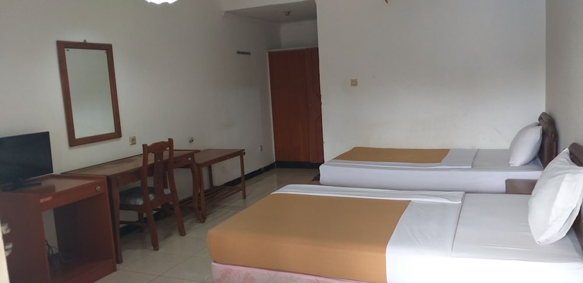 Imagen de la habitación del Hotel Intan Purwakarta. Foto 8