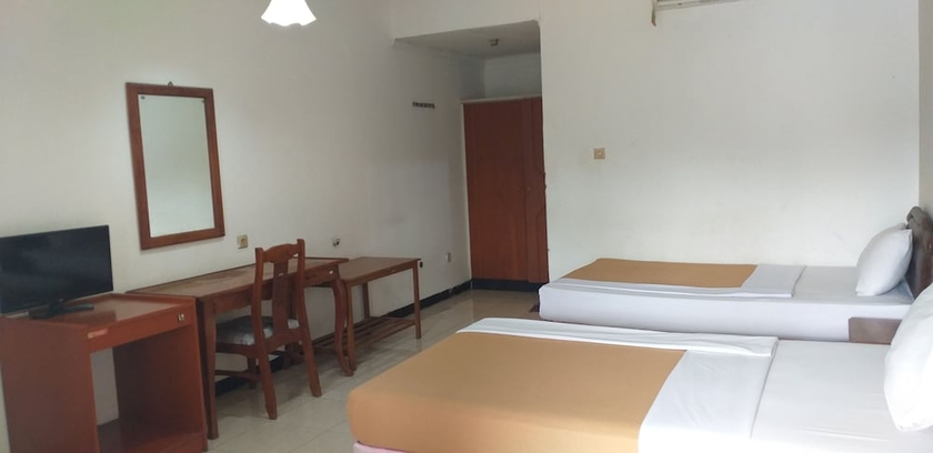 Imagen de la habitación del Hotel Intan Purwakarta. Foto 9