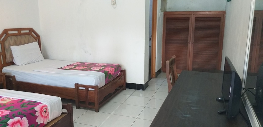 Imagen de la habitación del Hotel Intan Purwakarta. Foto 11