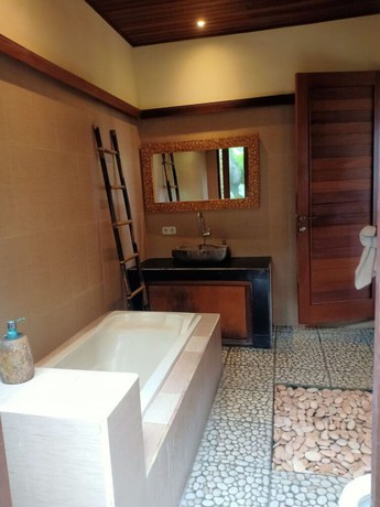 Imagen de la habitación del Hotel Intan Villa and Suite Ubud. Foto 5