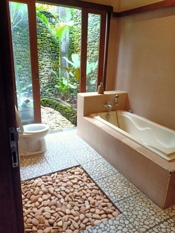 Imagen de la habitación del Hotel Intan Villa and Suite Ubud. Foto 10